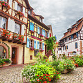 town square in Alsace village Eguisheim in Strasbourg region 